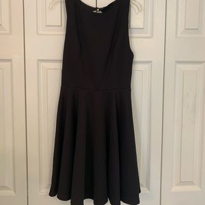 Lulu’s black open back mini dress